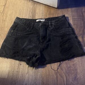 black ripped jean shorts